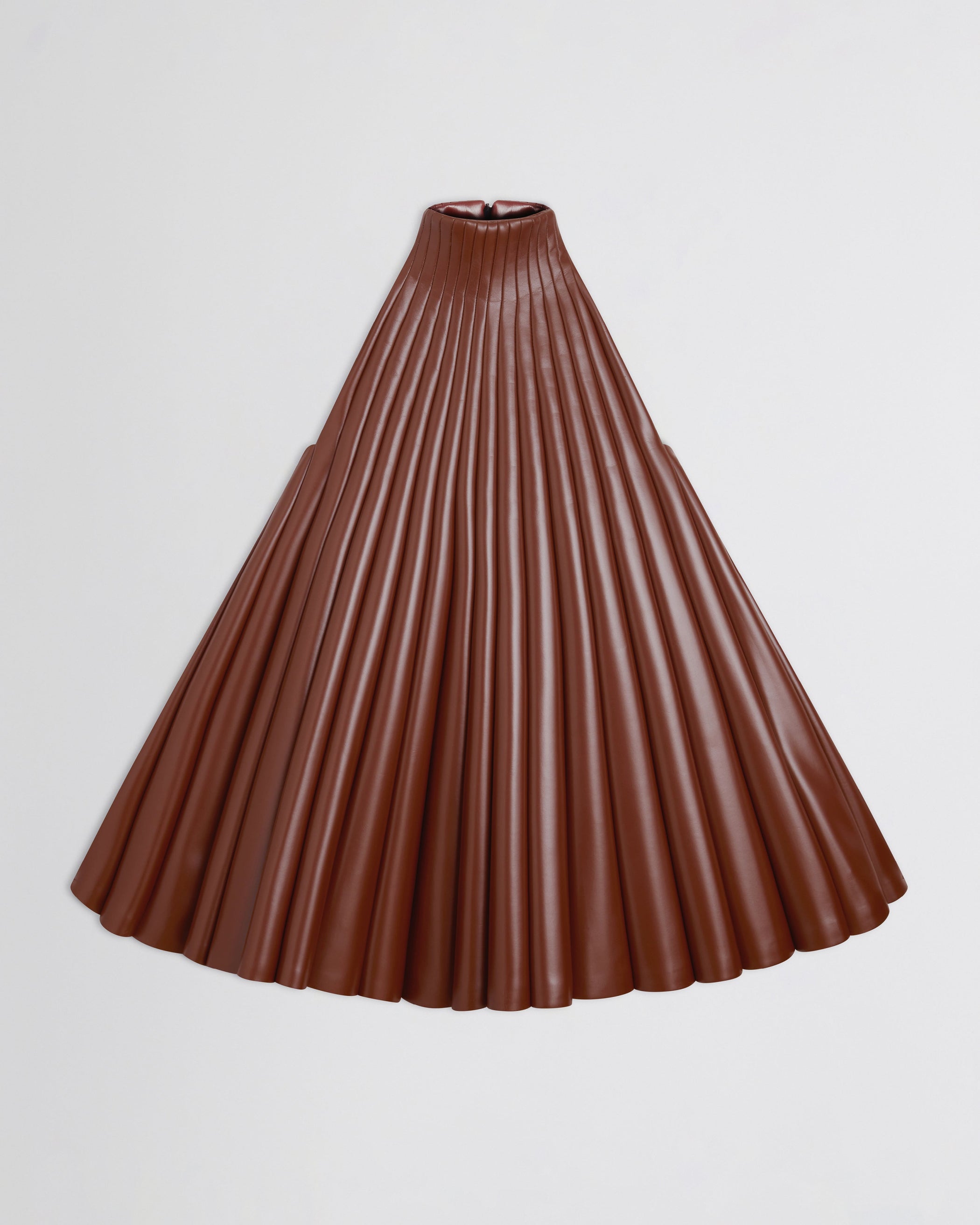 Flat front view of Accordion Top in brick bonded jersey