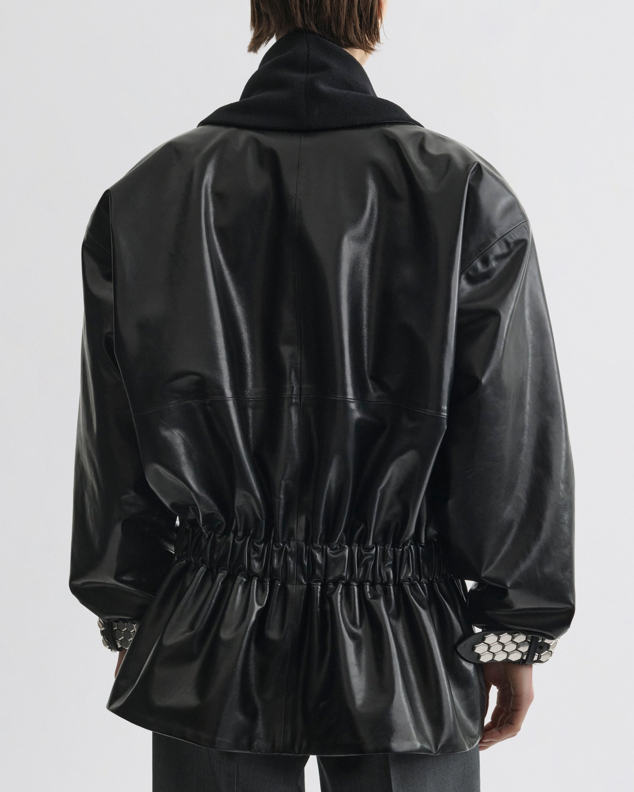 Back view of Stud Jacket in black leather