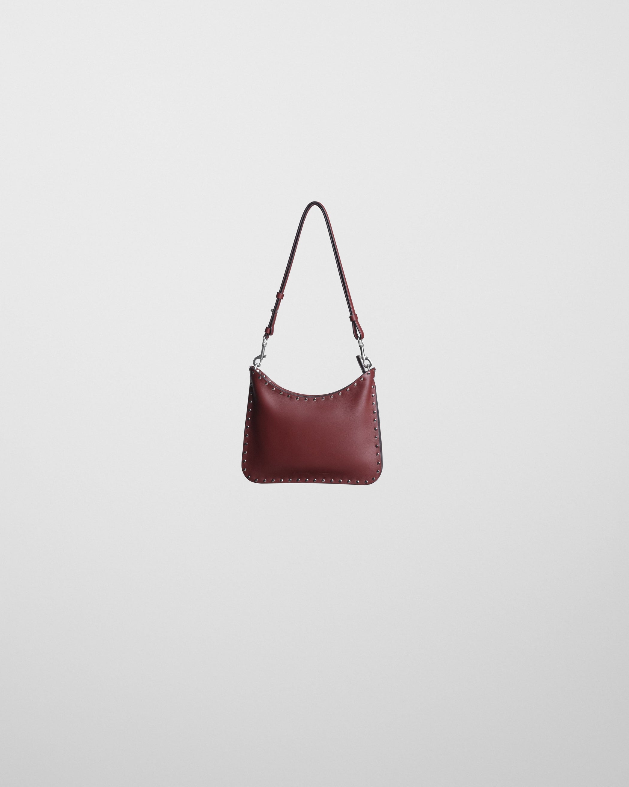 Flat front view of SMALL STUD GIG BAG in chestnut leather