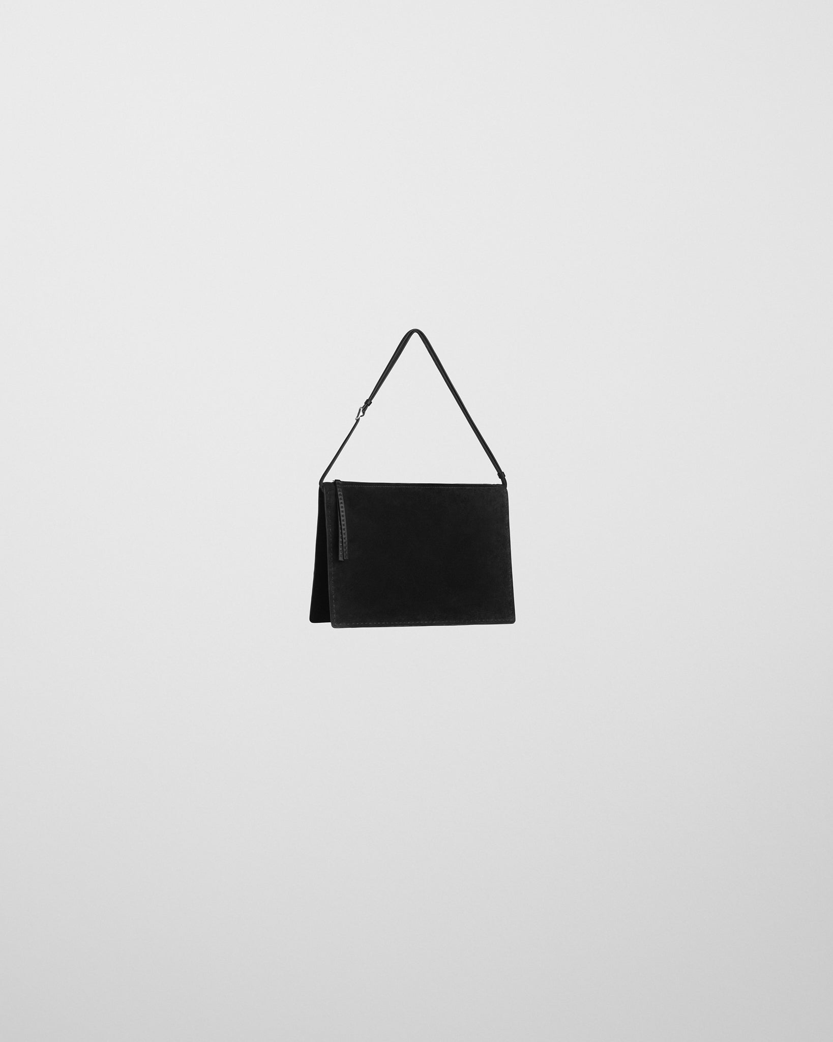Side view of GLOVE POCHETTE in black suede.