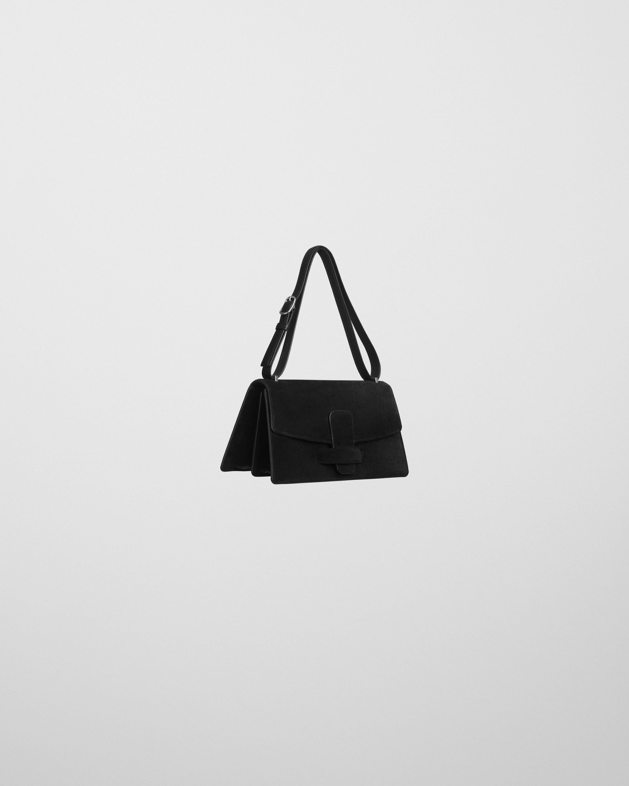 Angled side view of BAR BAG in black suede
