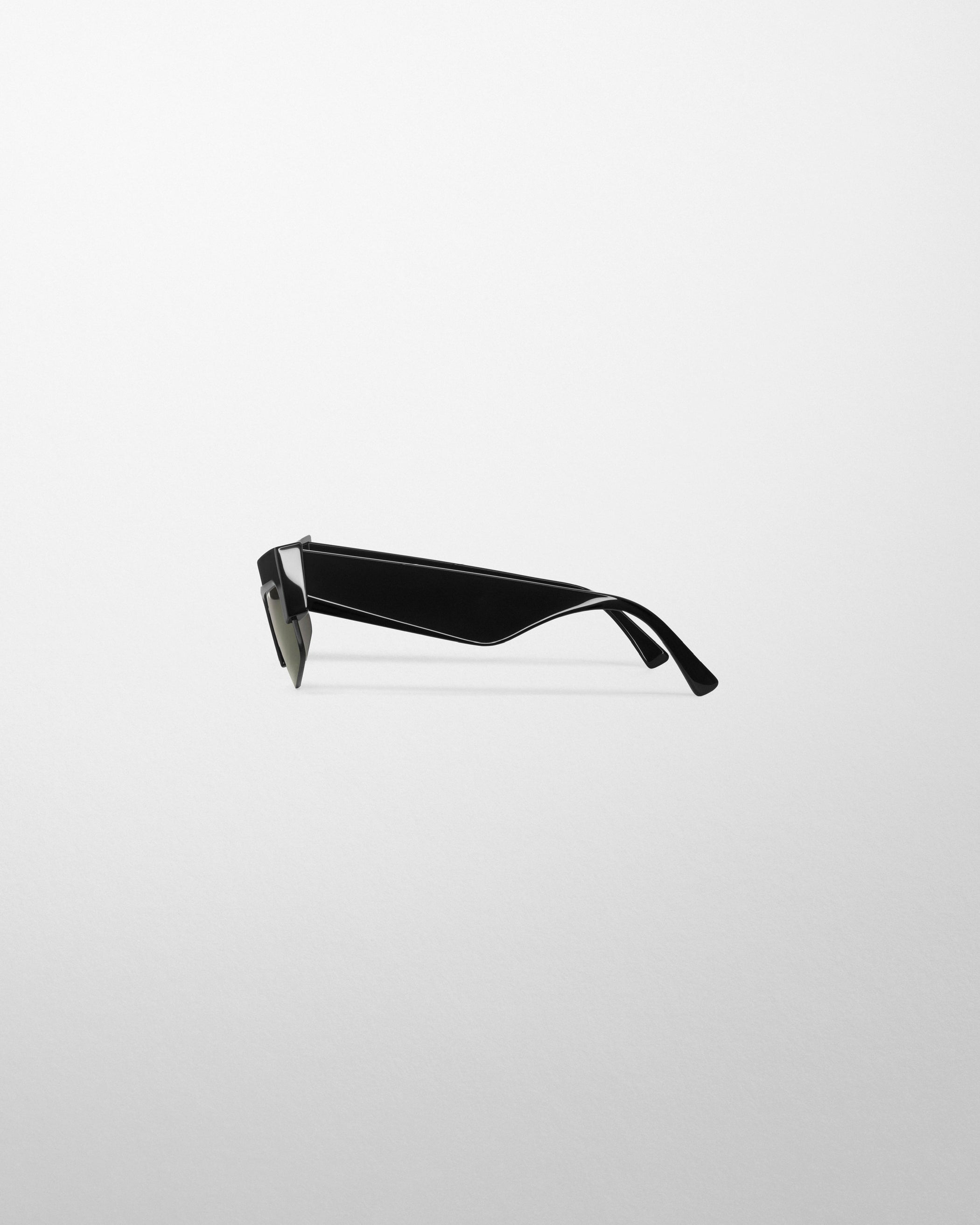 Flat side view of SLICED CRUISE SUNGLASSES in black acetate