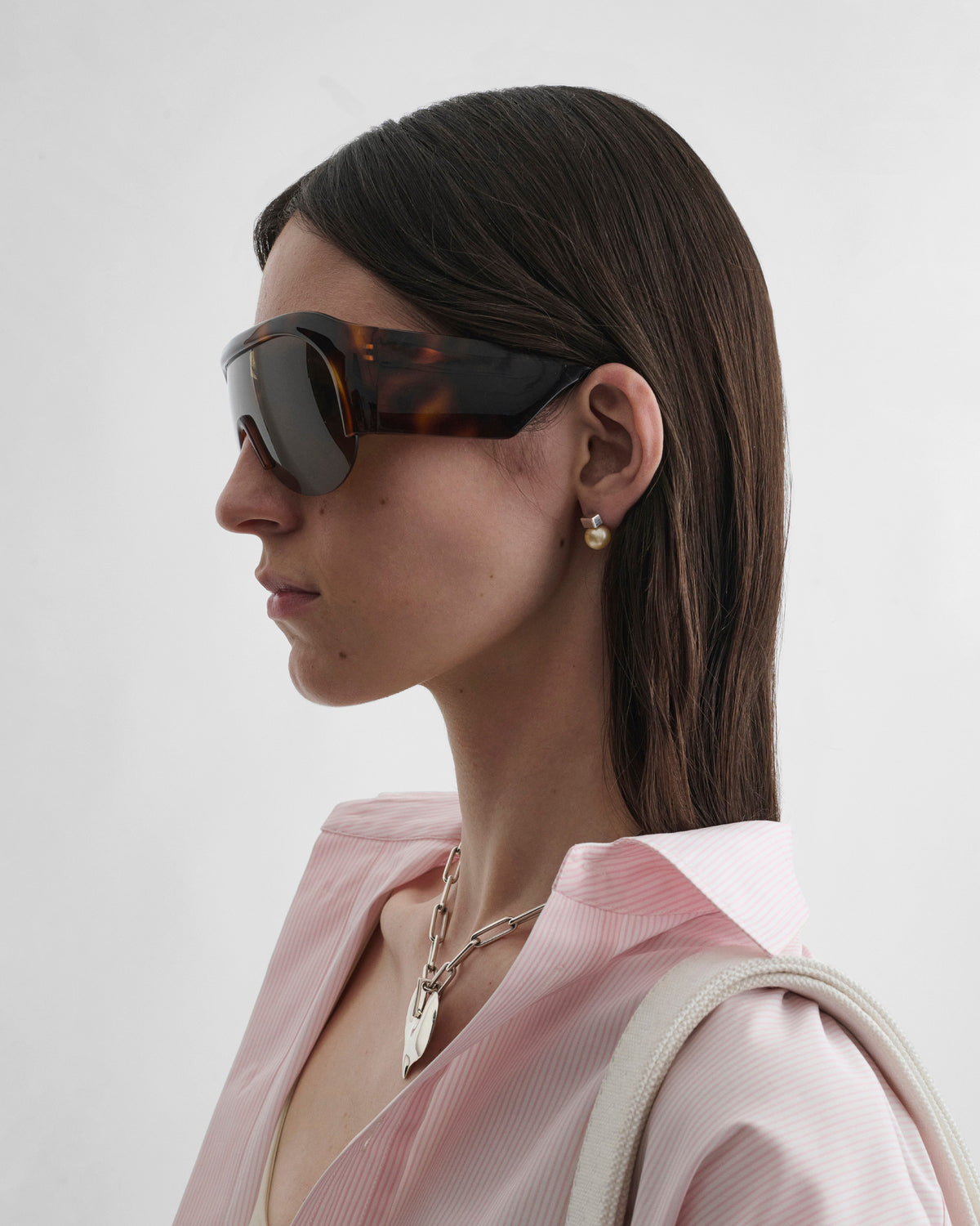Side view of HALF BOMBÉ SUNGLASSES in cognac tortoiseshell acetate