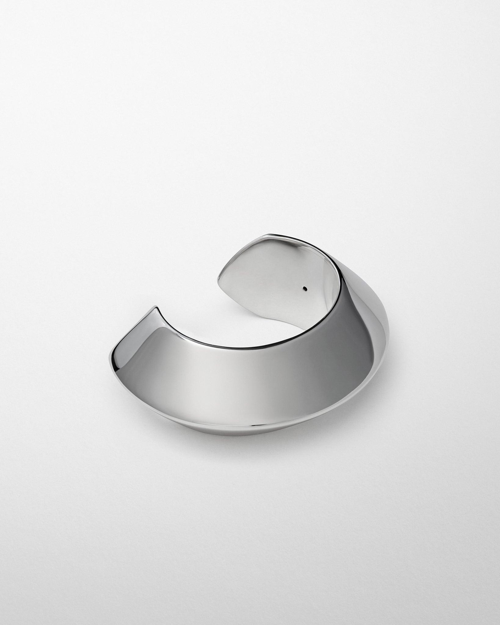 Angled top view of ORB CUFF in silver