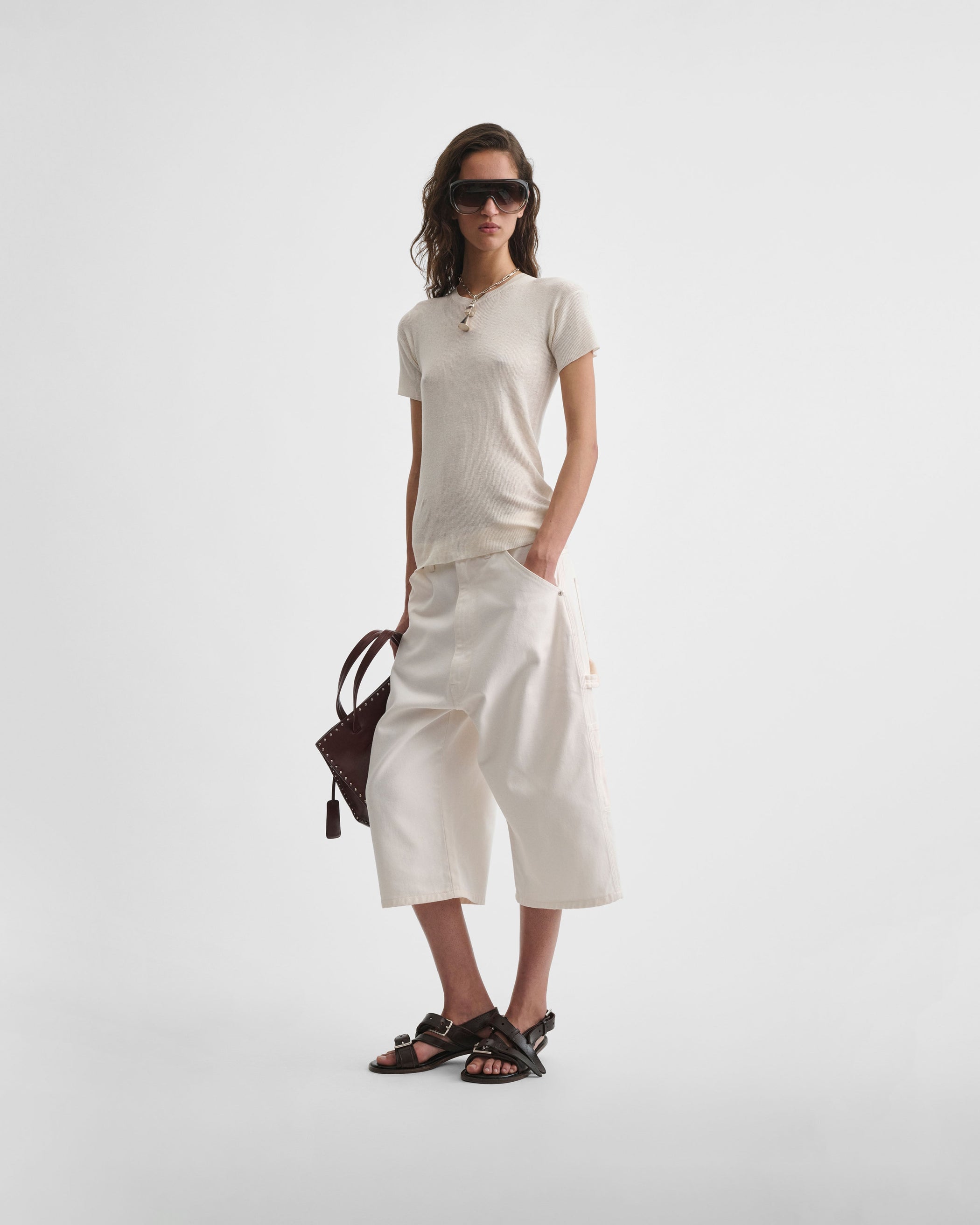 Front view of model wearing SCOOP NECK RIB T-shirt in ivory cotton