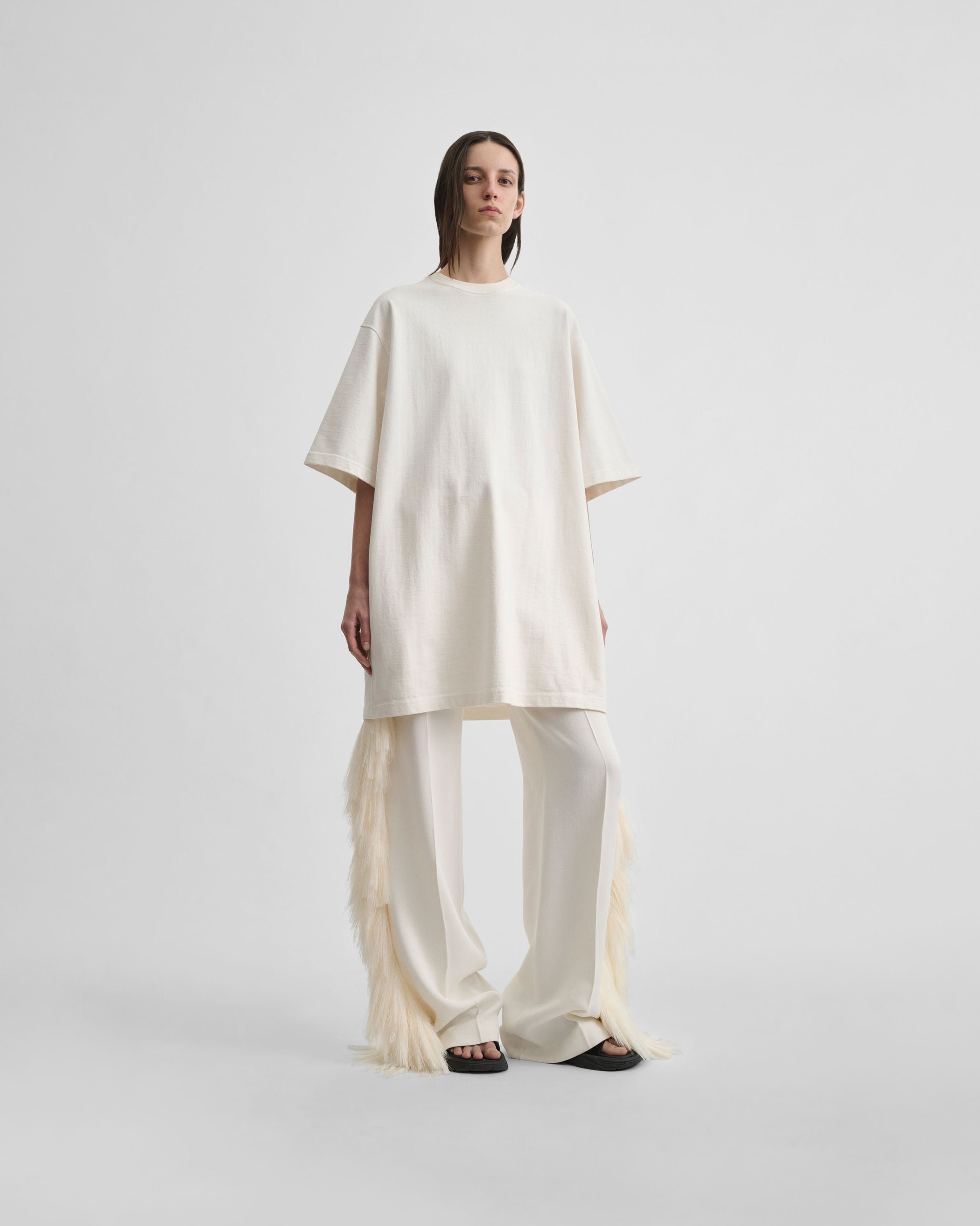 Front view of model wearing FRINGED TROUSERS in vanilla viscose