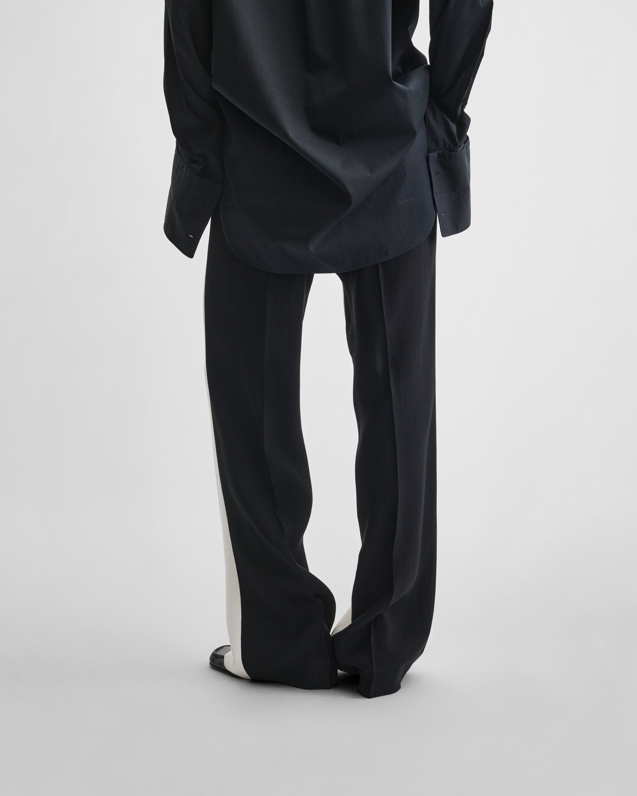 View of STRAIGHT LEG TROUSERS in black/off white woven viscose