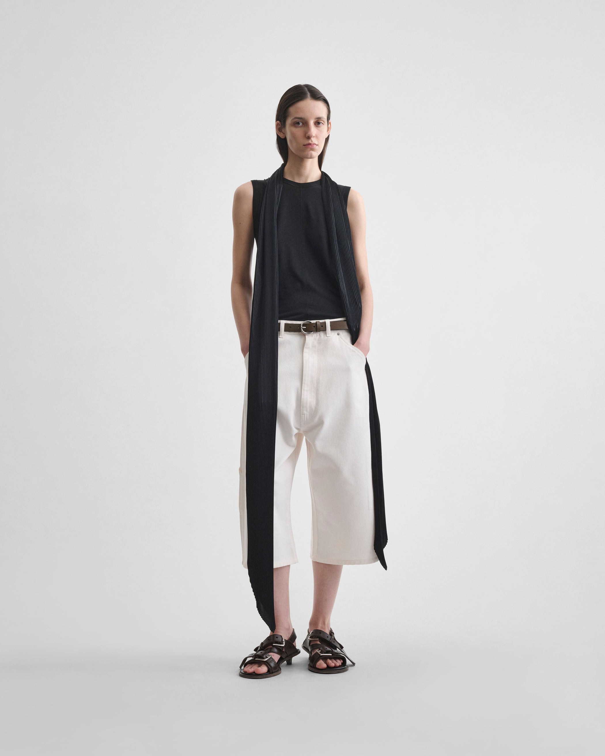 Full length front view of model wearing CARPENTER SHORTS in pale blush