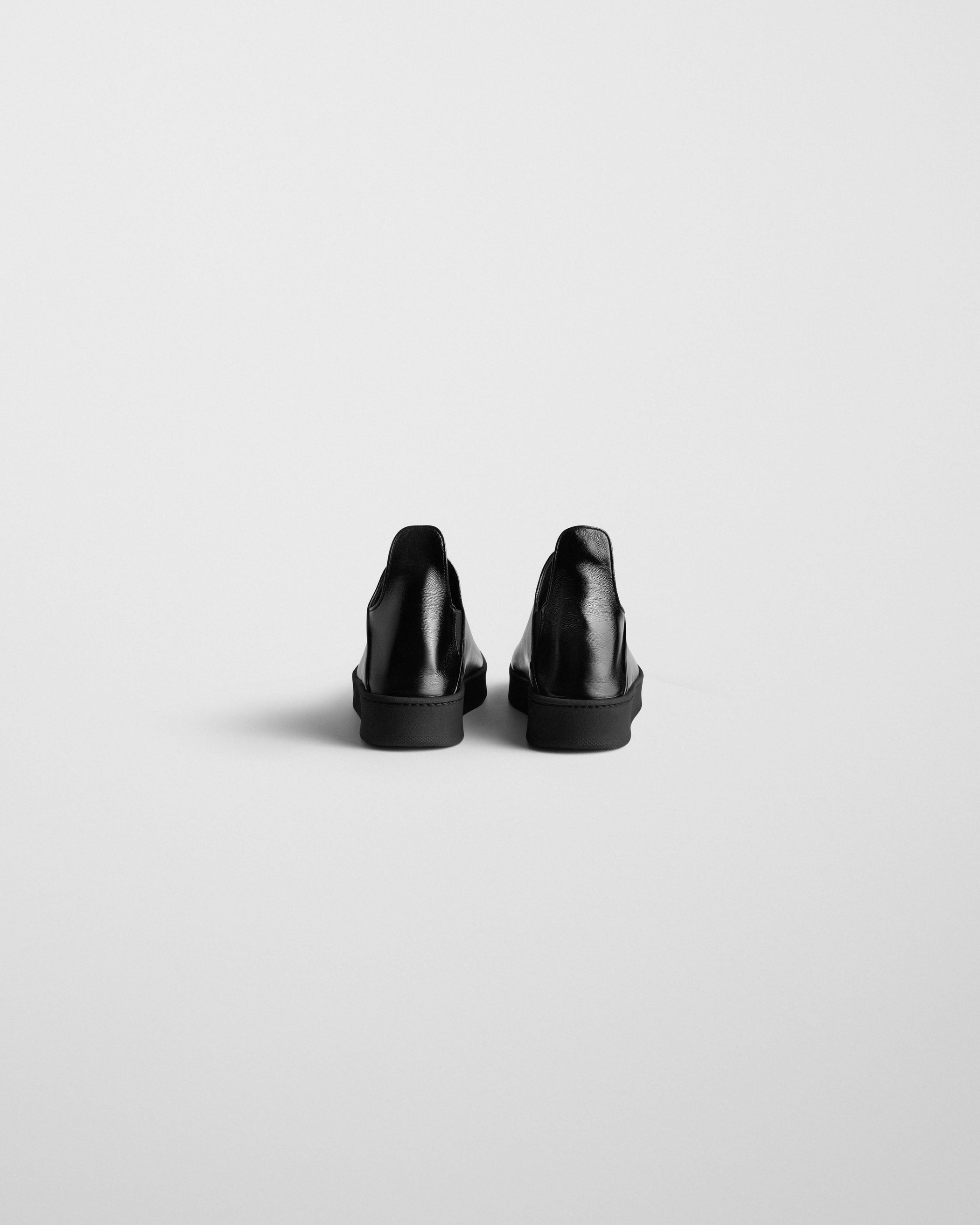 Back view of SLIP ON SNEAKER in black suede