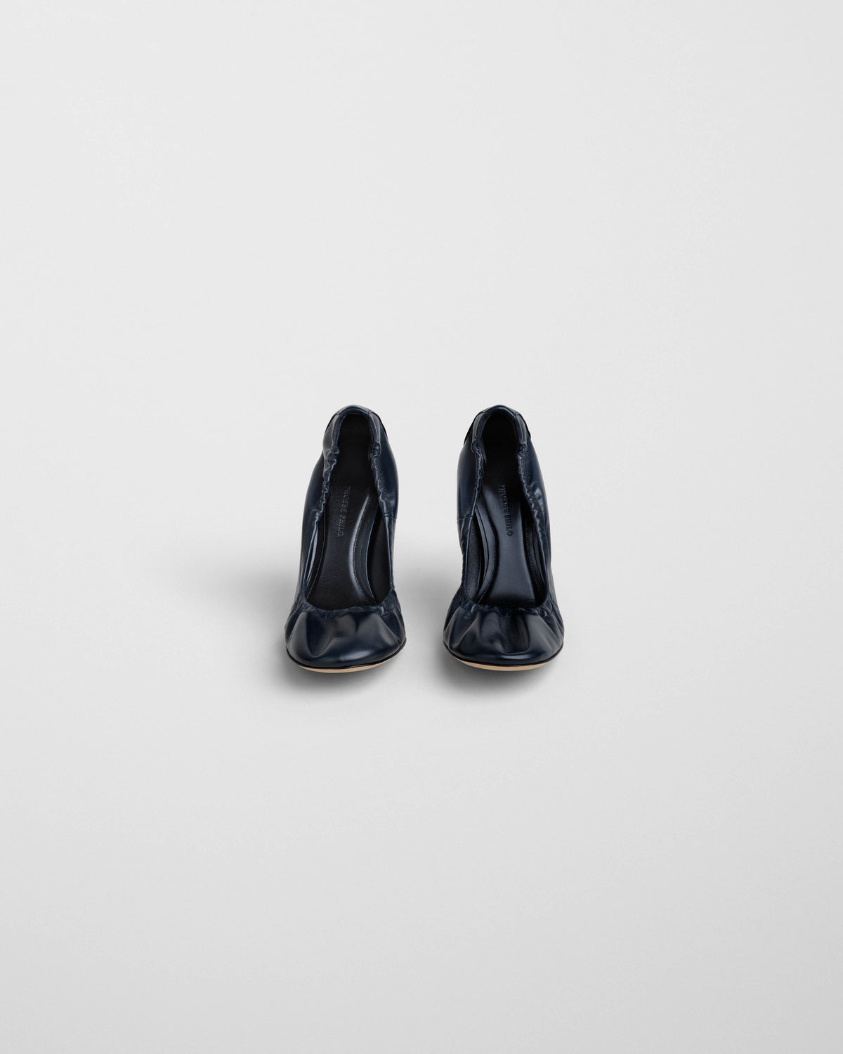 Front view of PUCKER PUMP 100 in dark navy leather