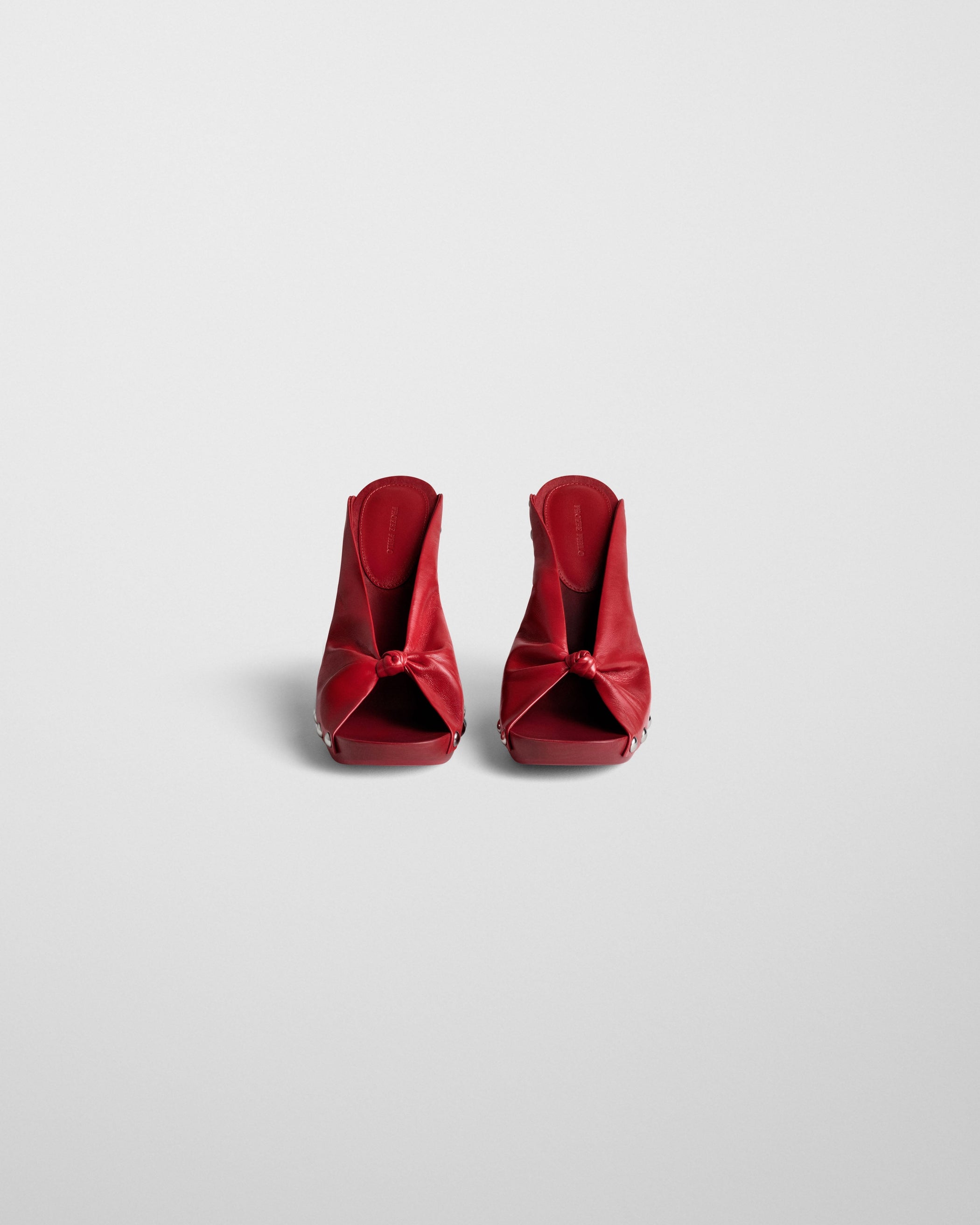 Front view of KNOTTED CLOG in candy red red