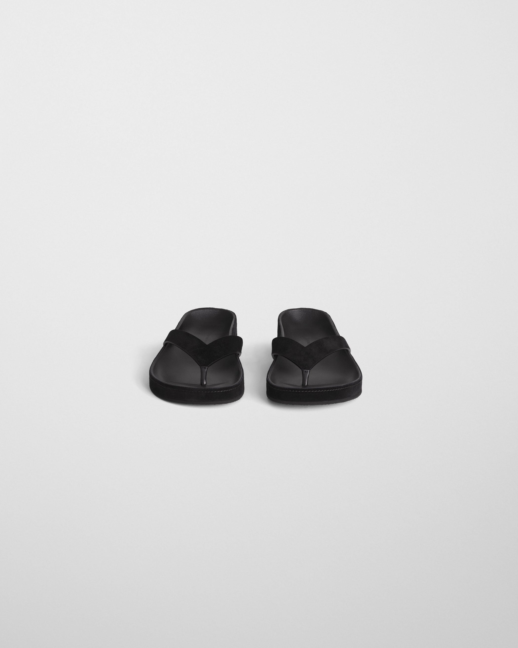 Front view of ROUND FLIP FLOP in black suede