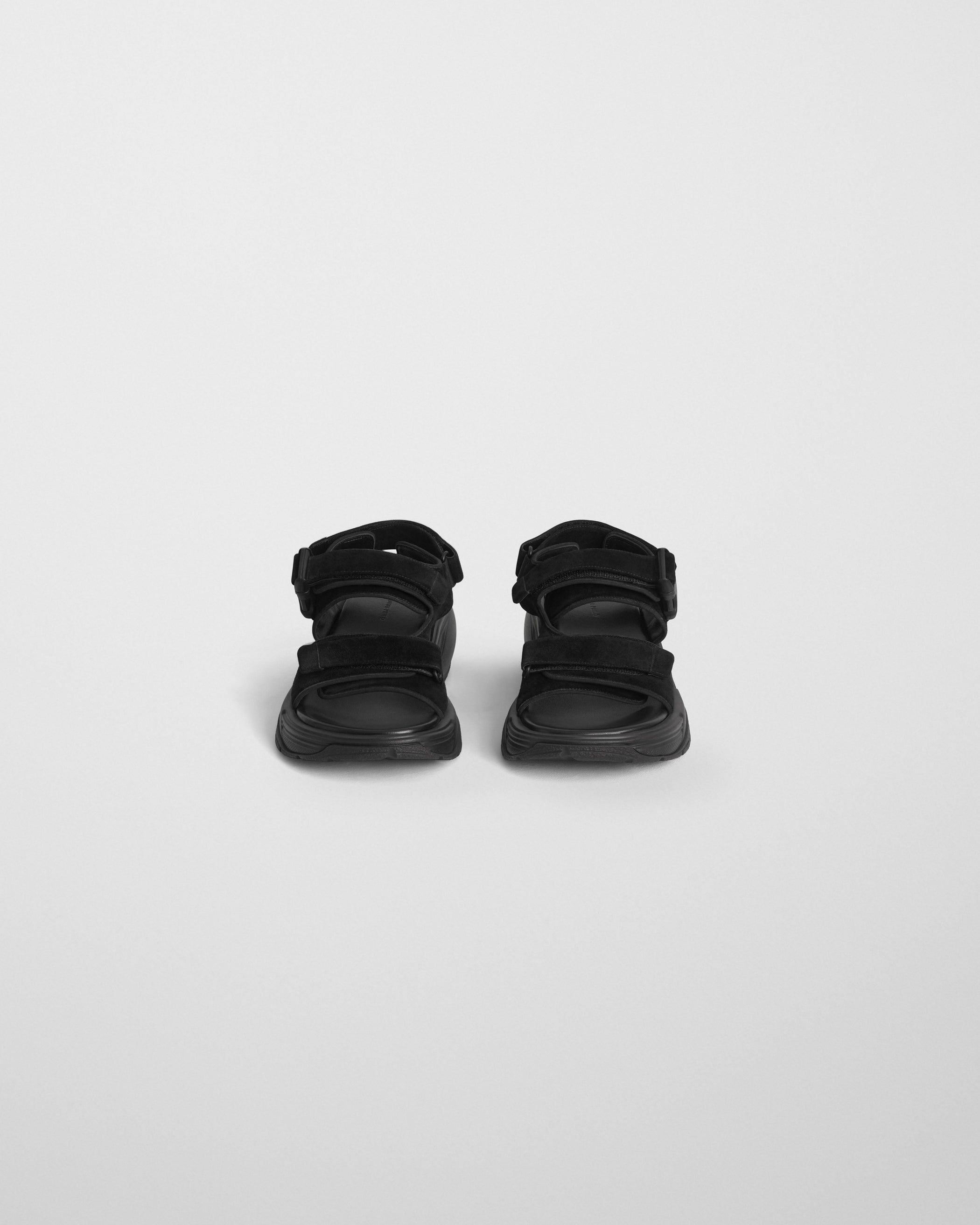 Front view of PACE RUNNER in black suede