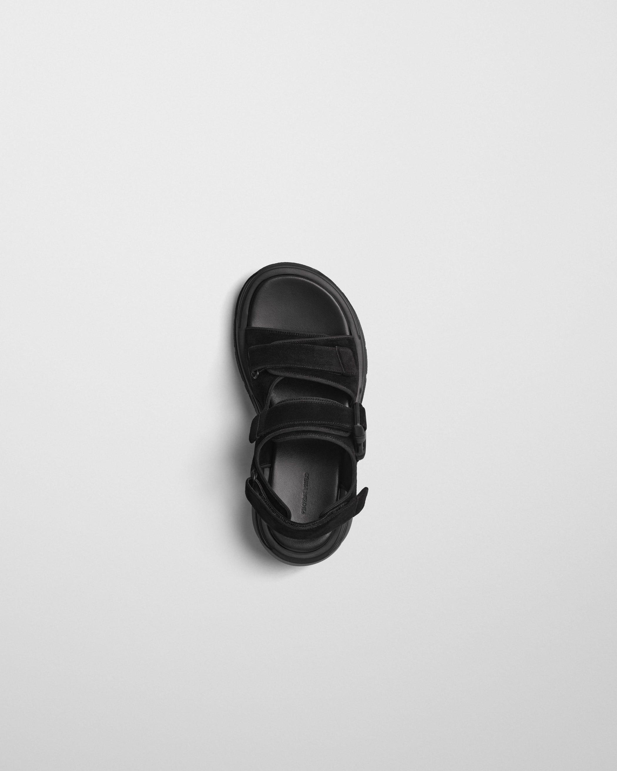 Top view of PACE RUNNER in black suede