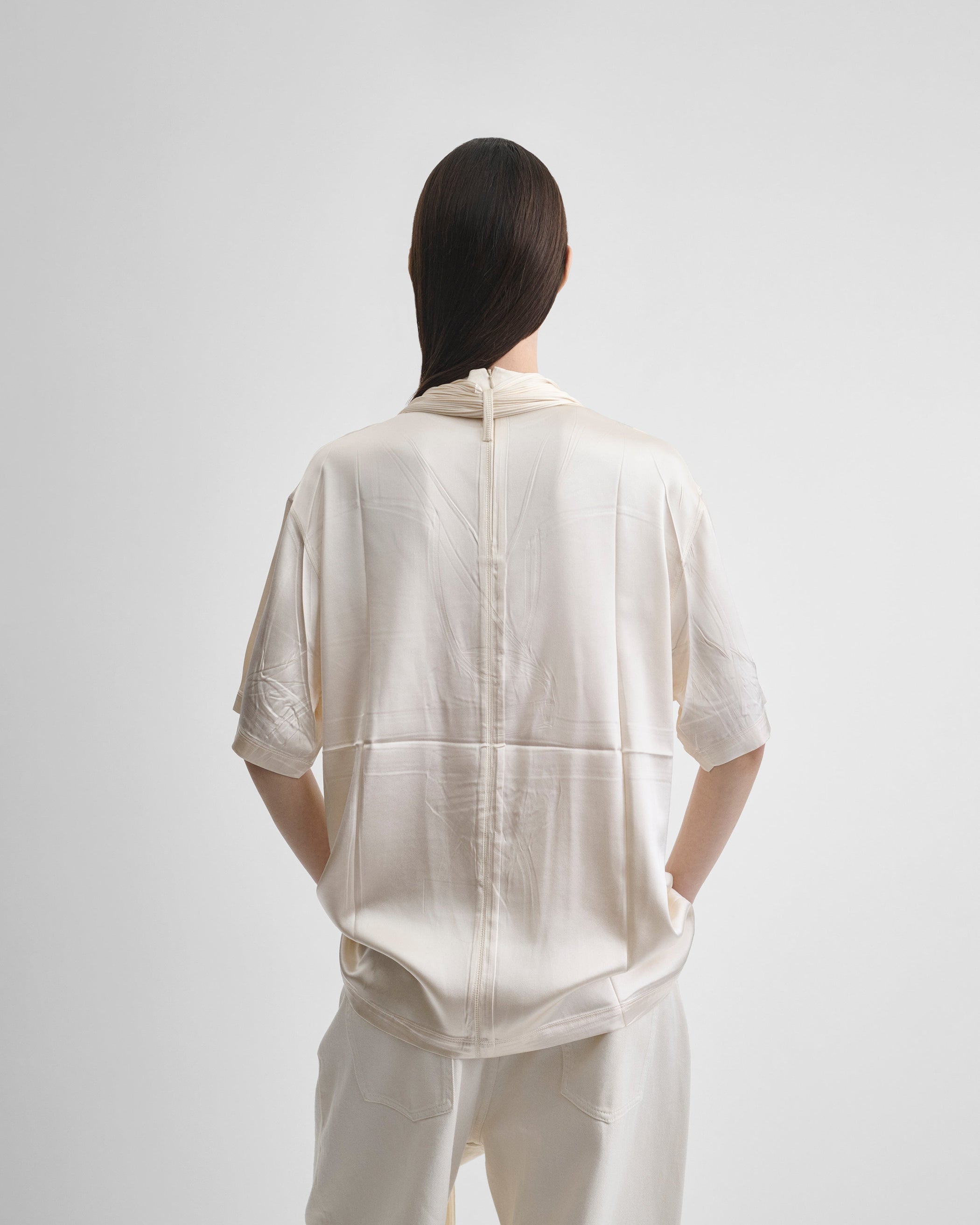 Back view of model wearing SILK SCARF T-SHIRT in cream silk