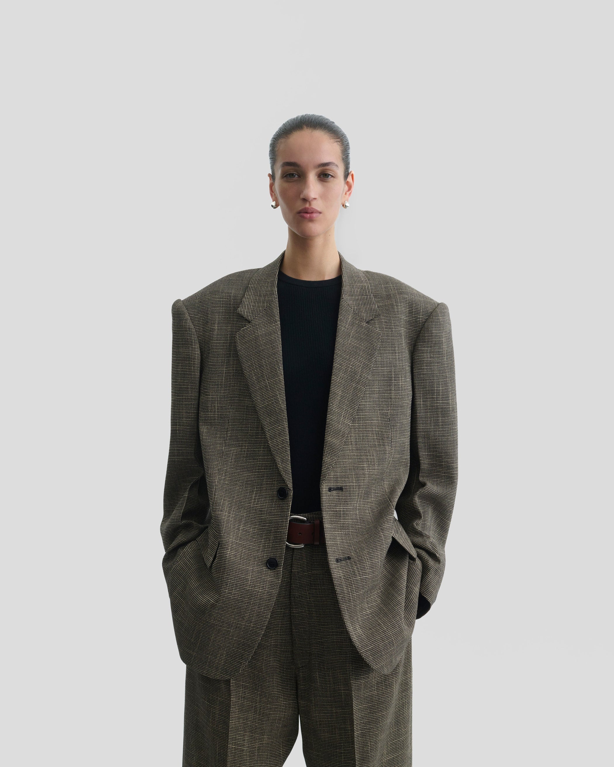 Front close up model view of the Tailored Jacket in salt and pepper