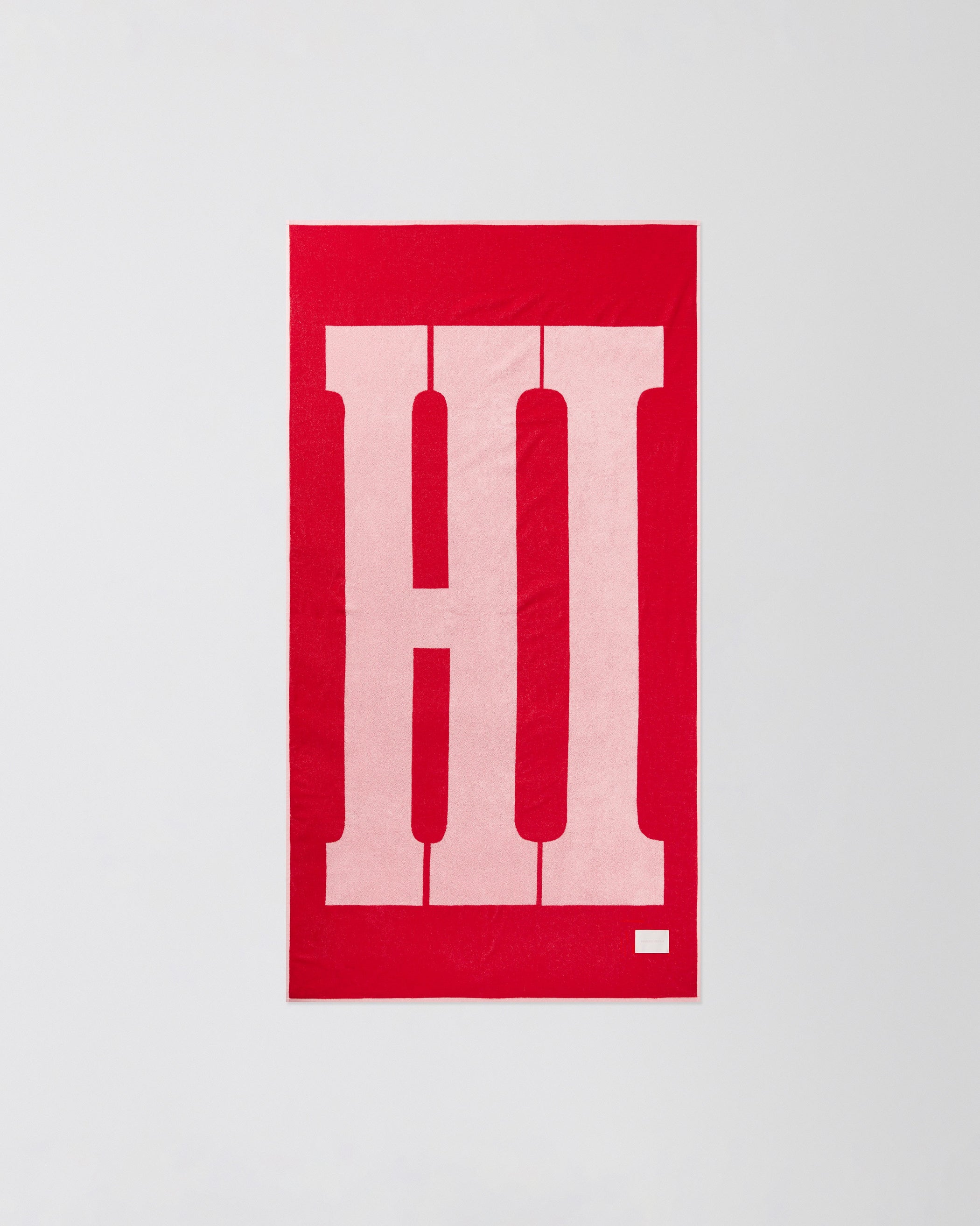 Flat back view of HI TOWEL in washed pink cotton