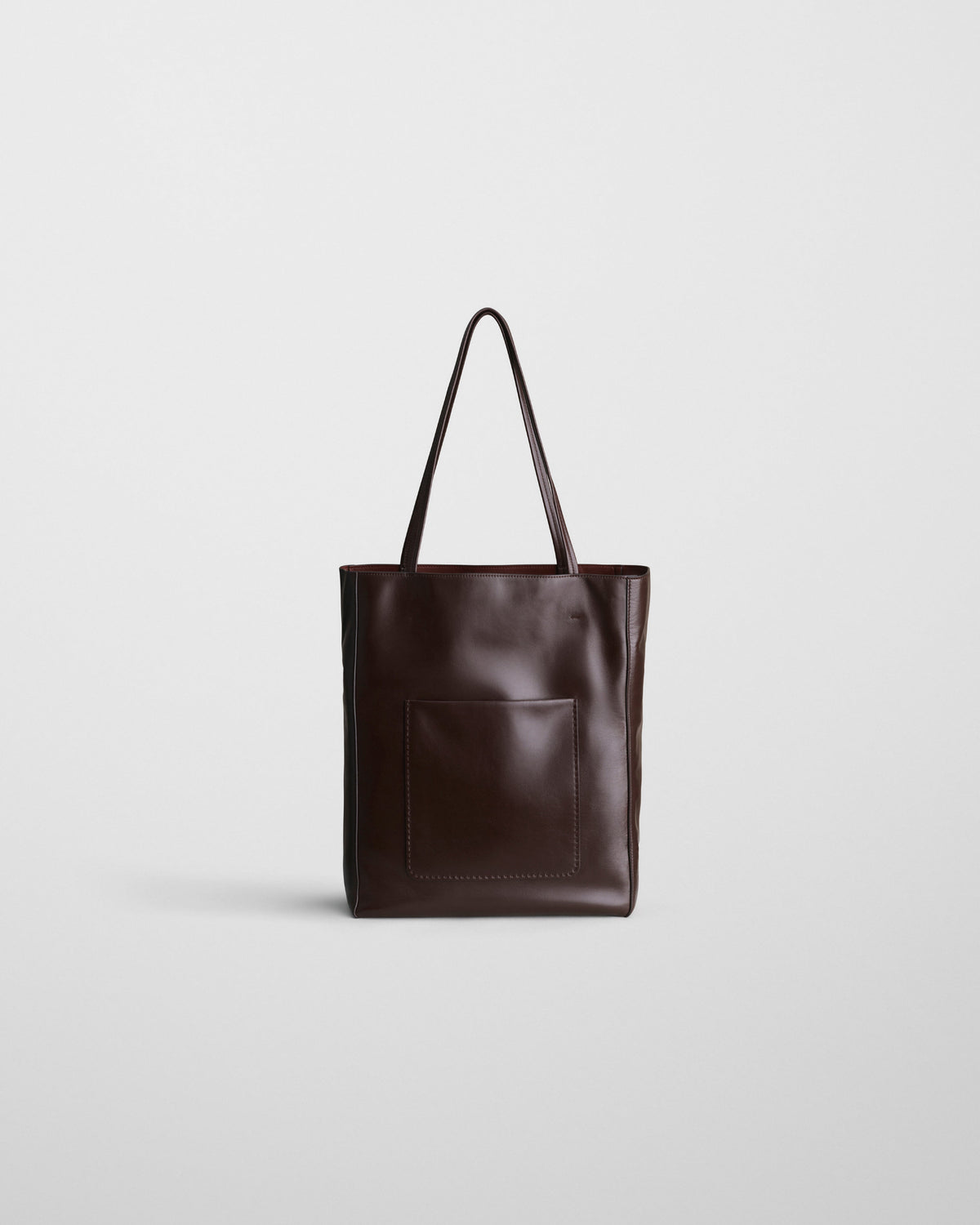 Front view of PAPER TOTE in chocolate brown leather