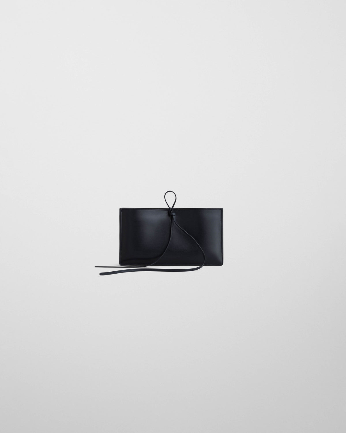Front view of SPLAY CLUTCH in dark navy leather