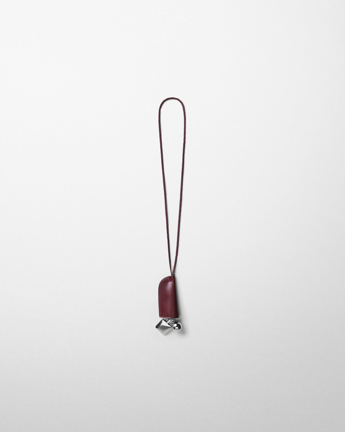 Front view of GLOVE LANYARD in crimson leather