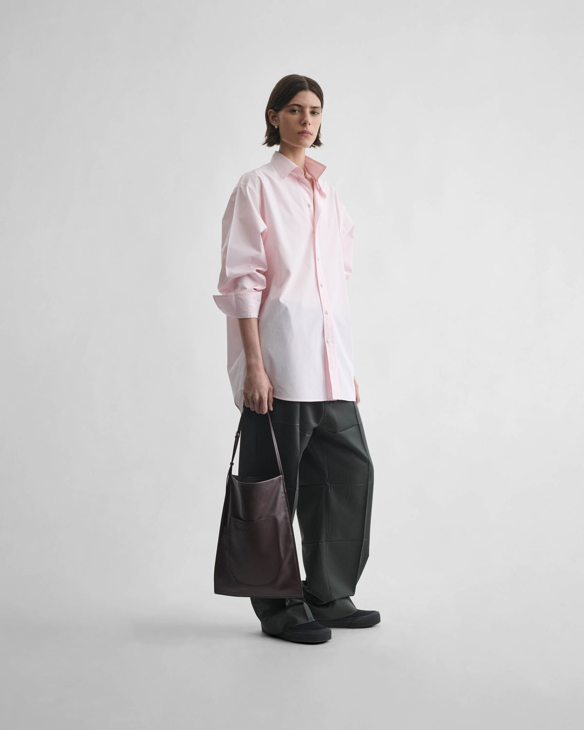 Front view of model wearing MEN'S SHIRT in pink cotton