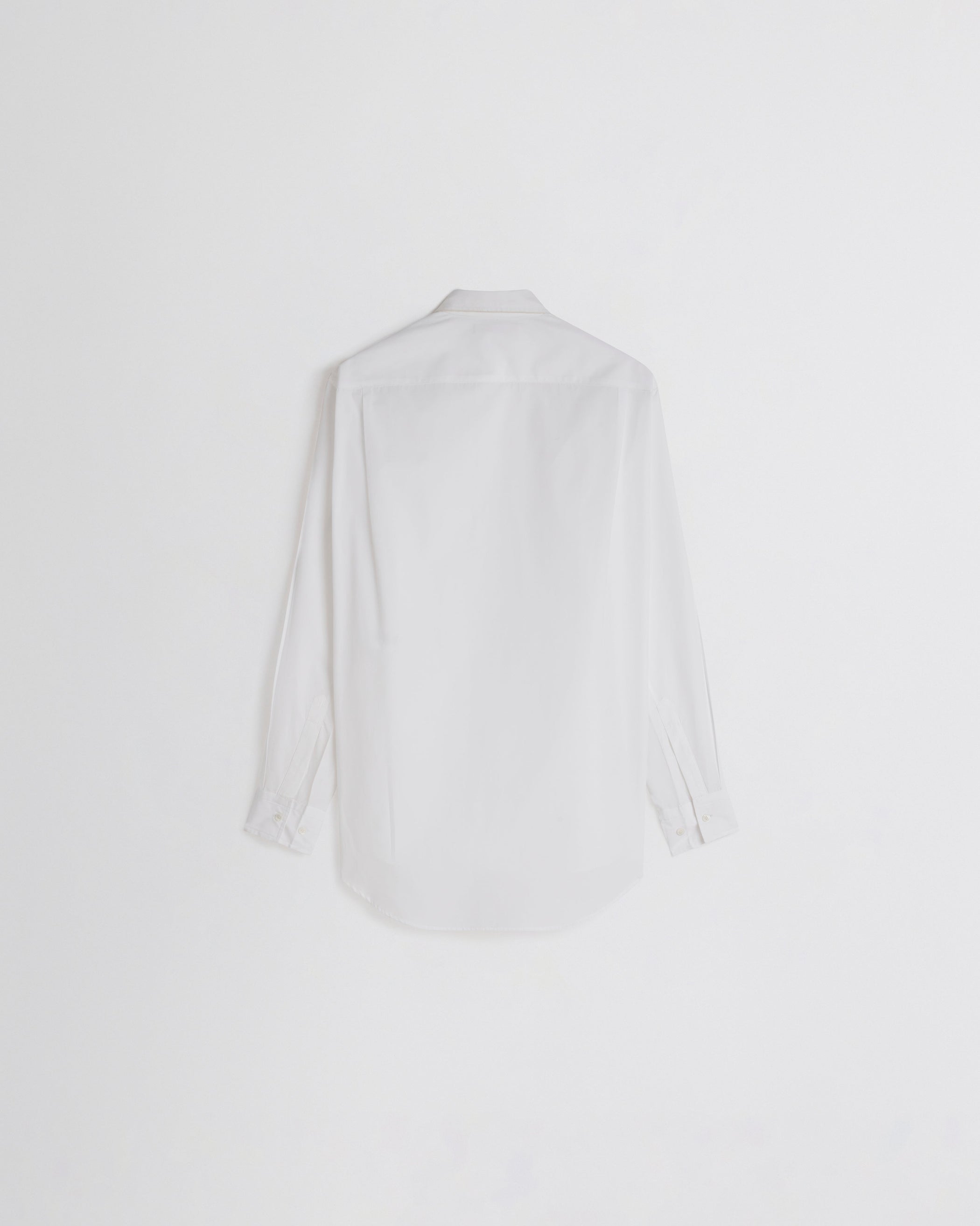 Flat back view of TUX SHIRT in white cotton