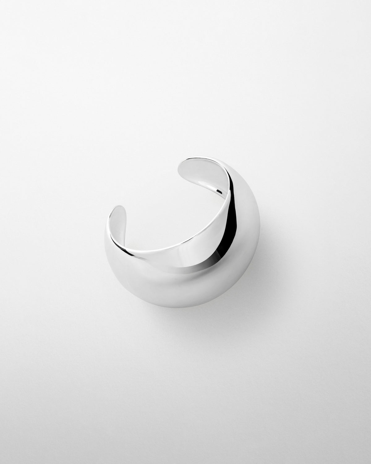 Side view of BOMBÉ CUFF in silver