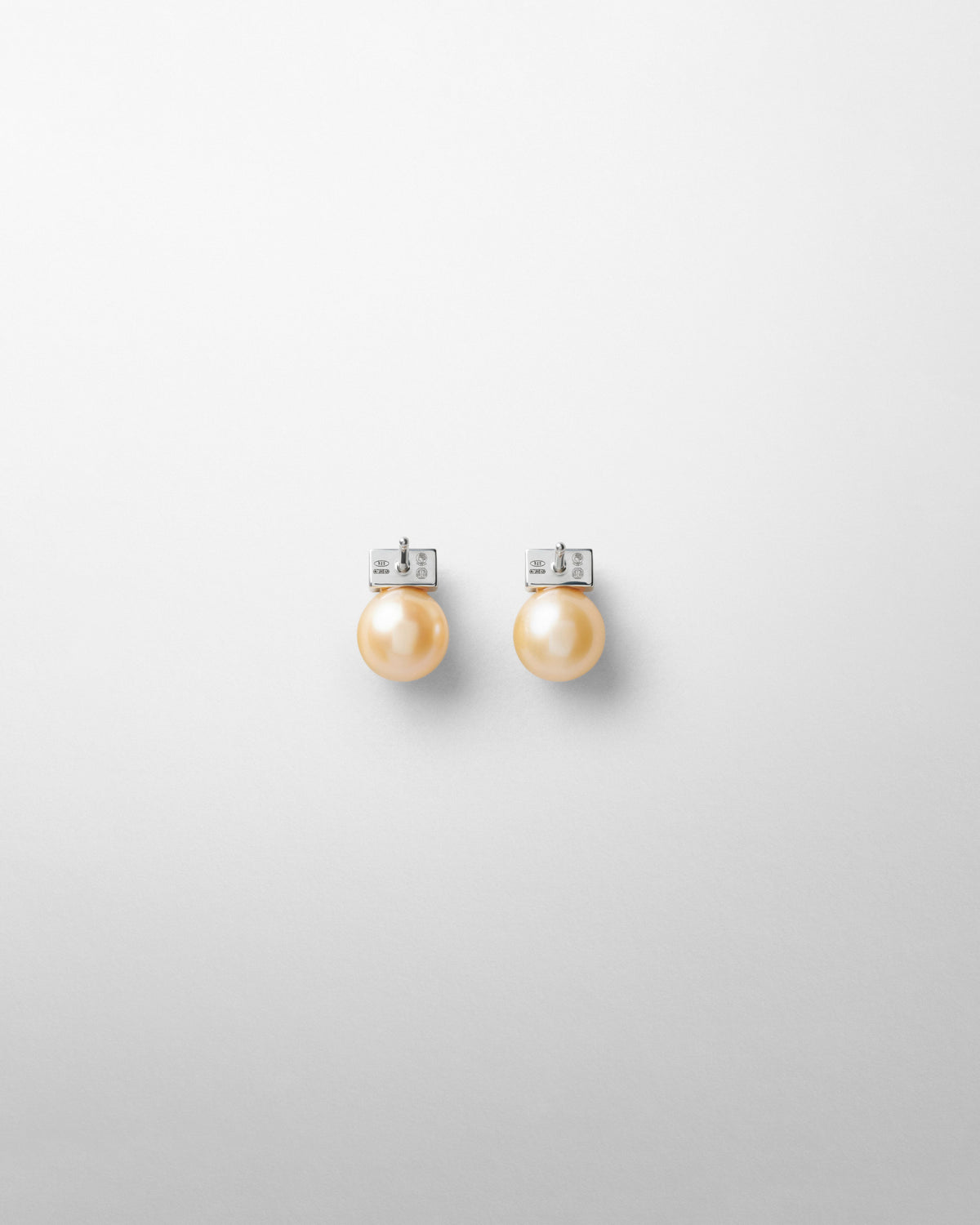 Back view of PEARL DROP STUDS in gold