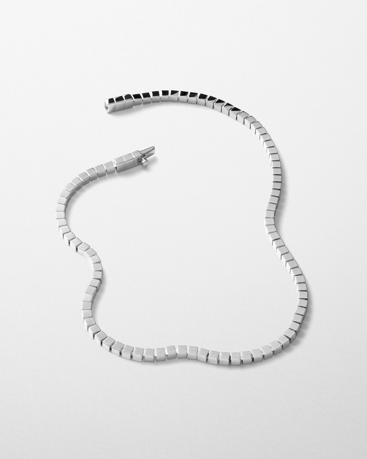 Detail view of CUBIC NECKLACE in silver