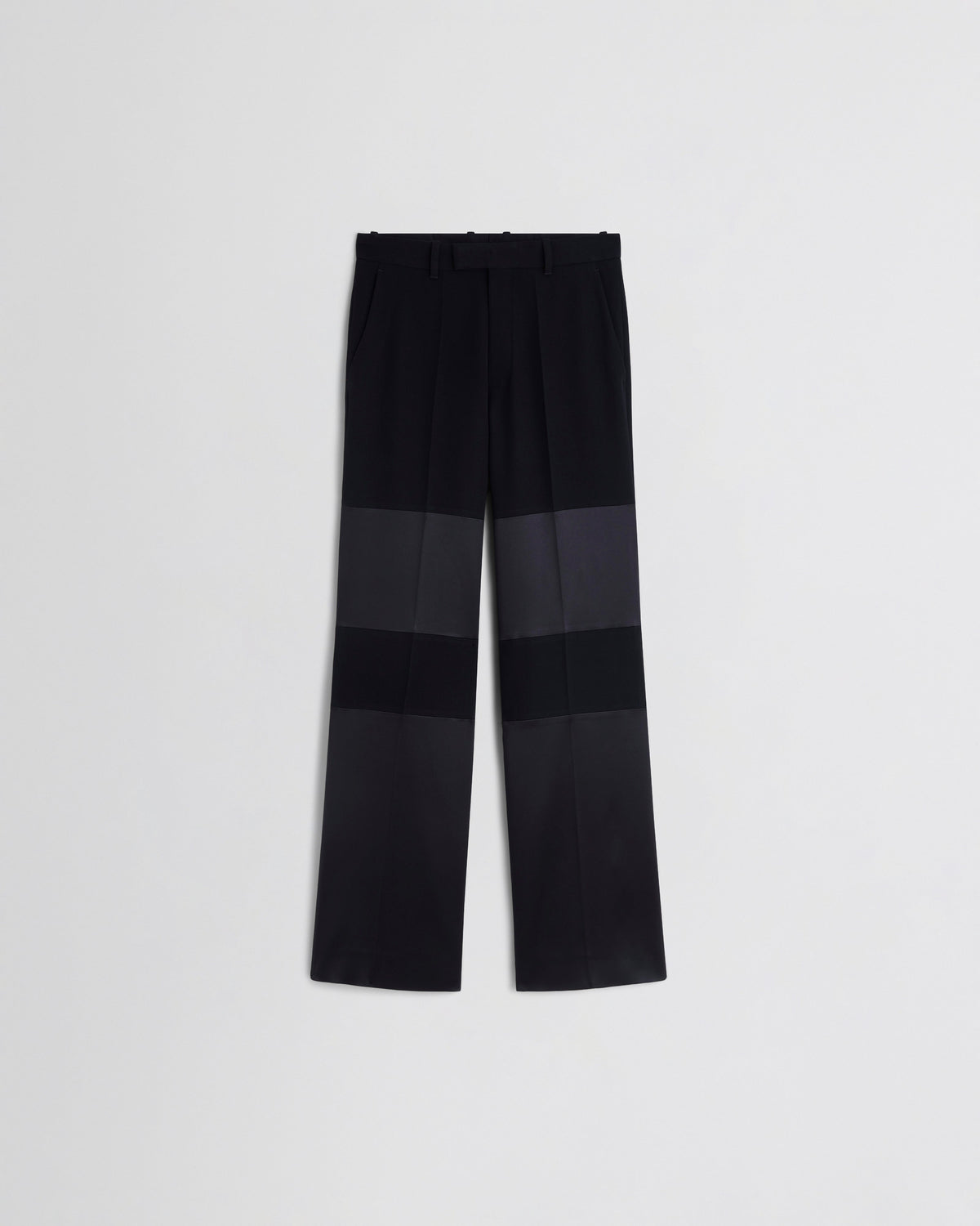 Front view of STACKED TUX TROUSERS in black wool