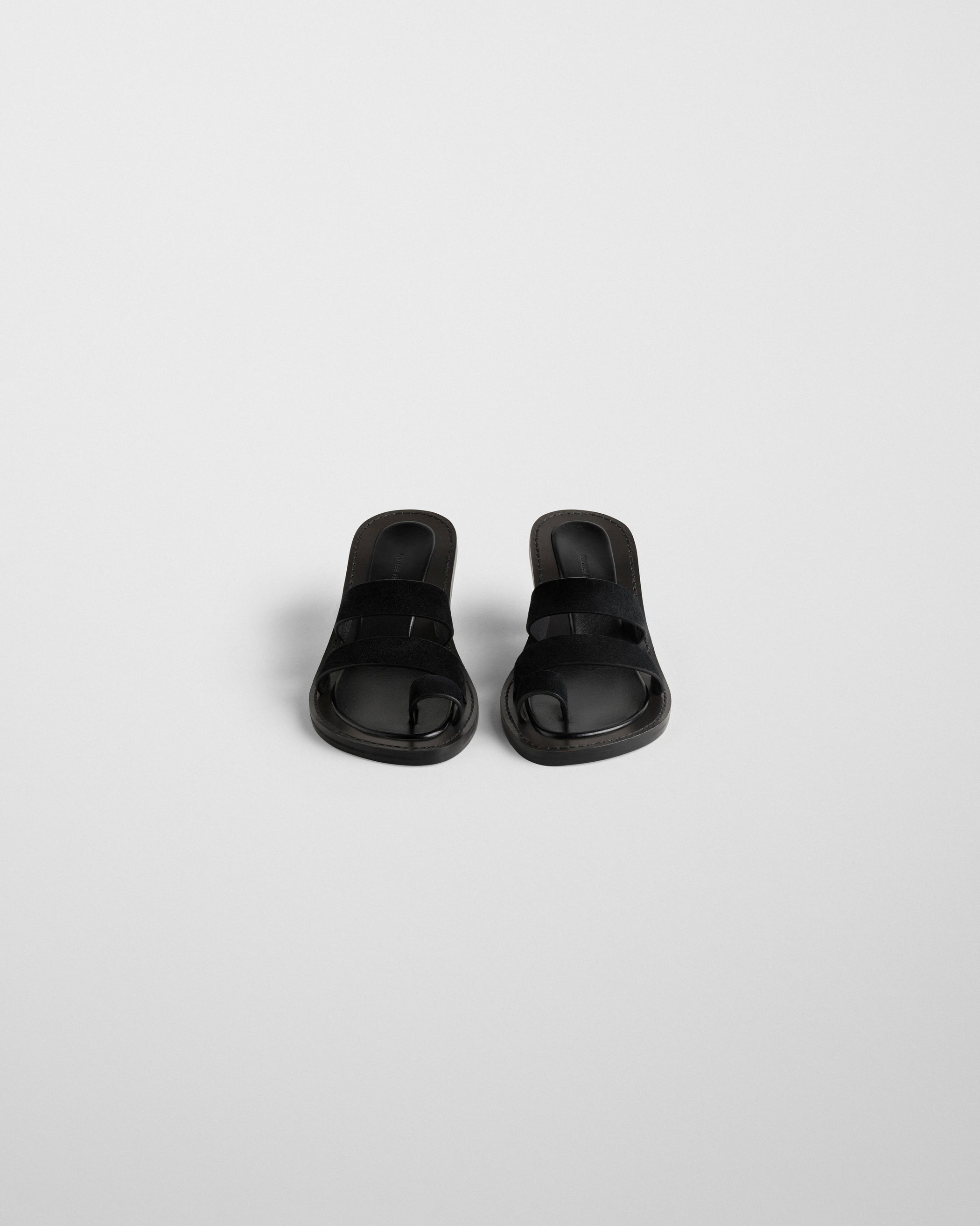 Flat front image of STRAP MULE in black suede