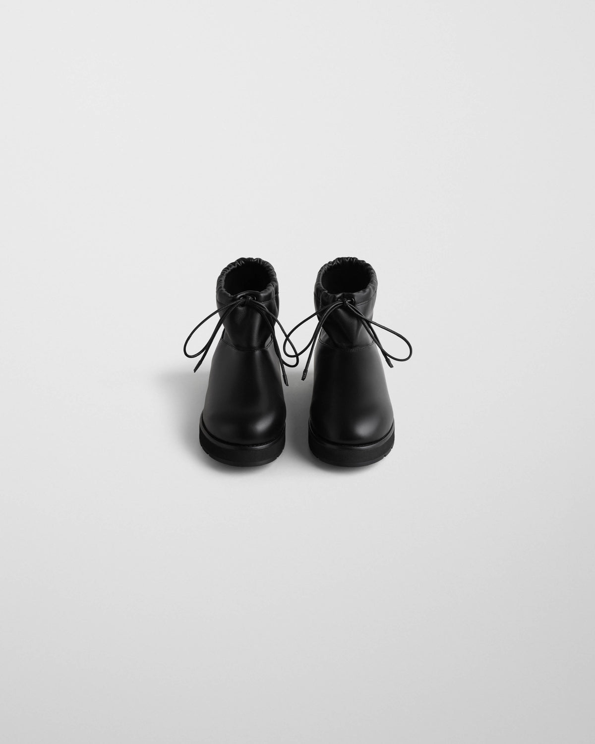 Front shot of SHEARLING BOOTIE in black leather