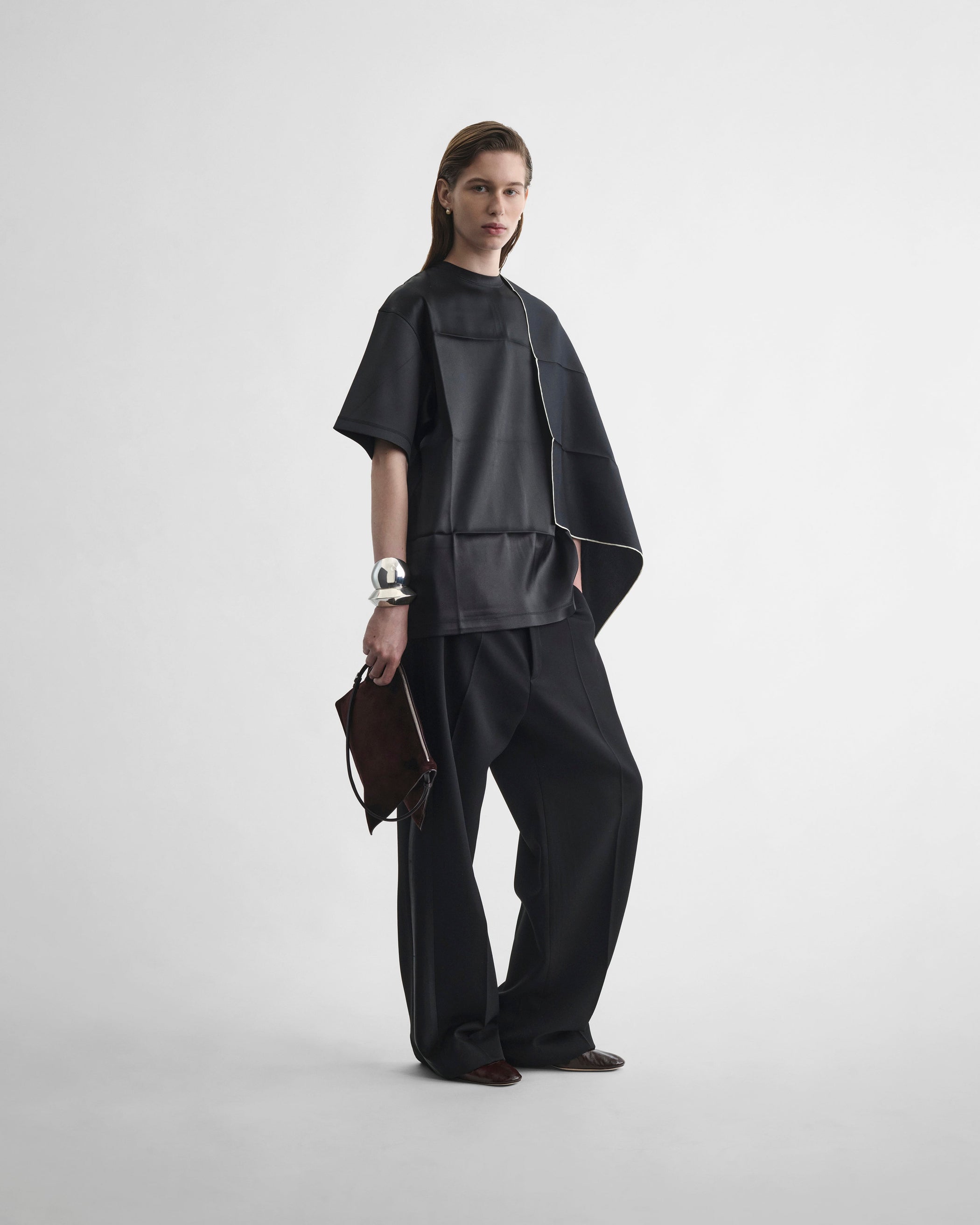 Front view of model wearing SCARF TOP in black silk
