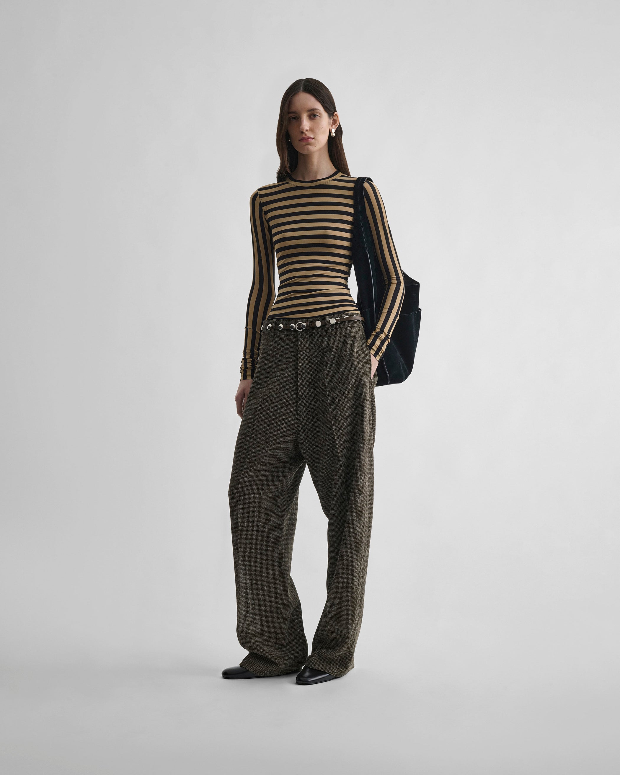 Front view of model wearing STRIPE TOP in toffee/black viscose