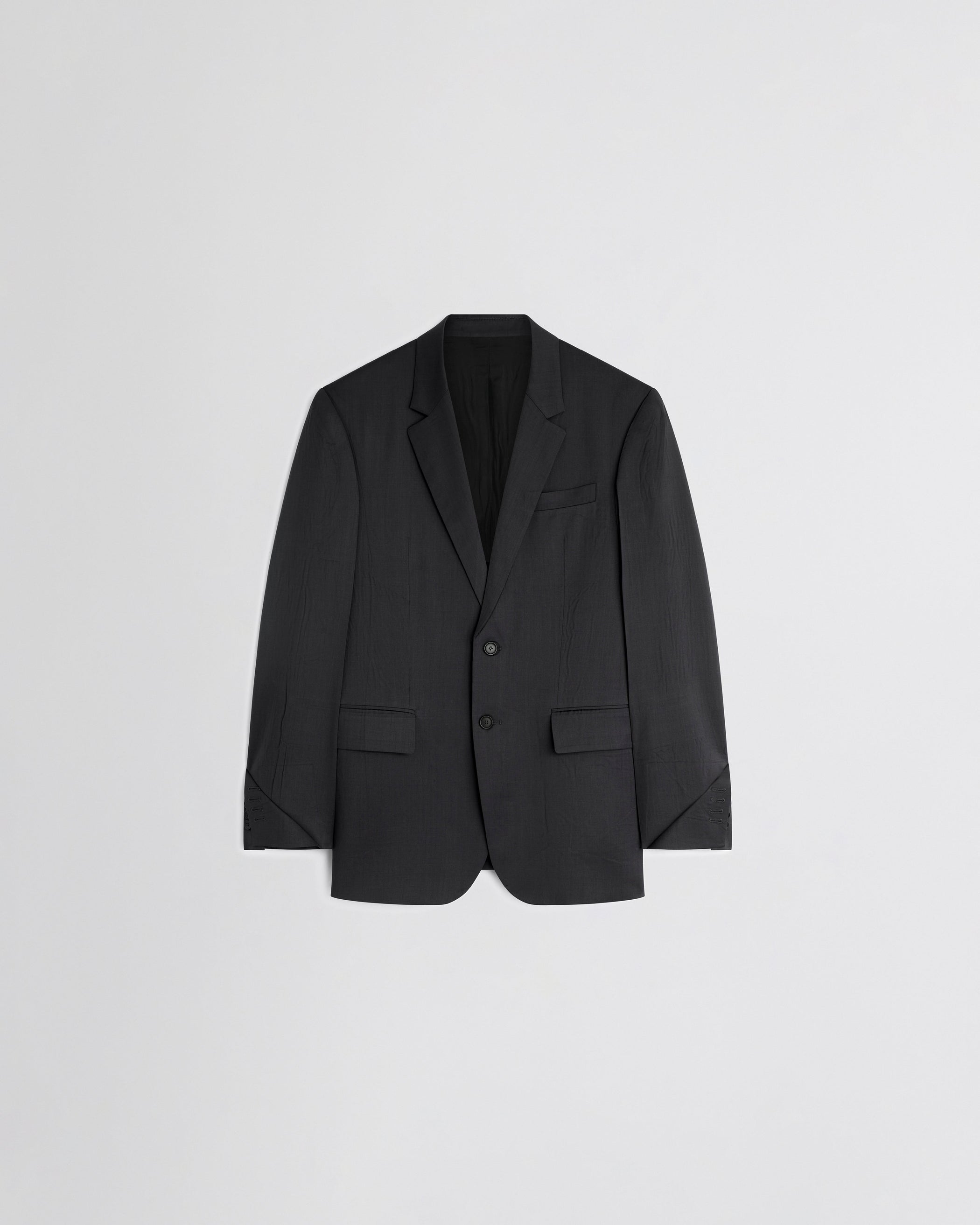 Flat front view of NEAPOLITAN JACKET in black wool
