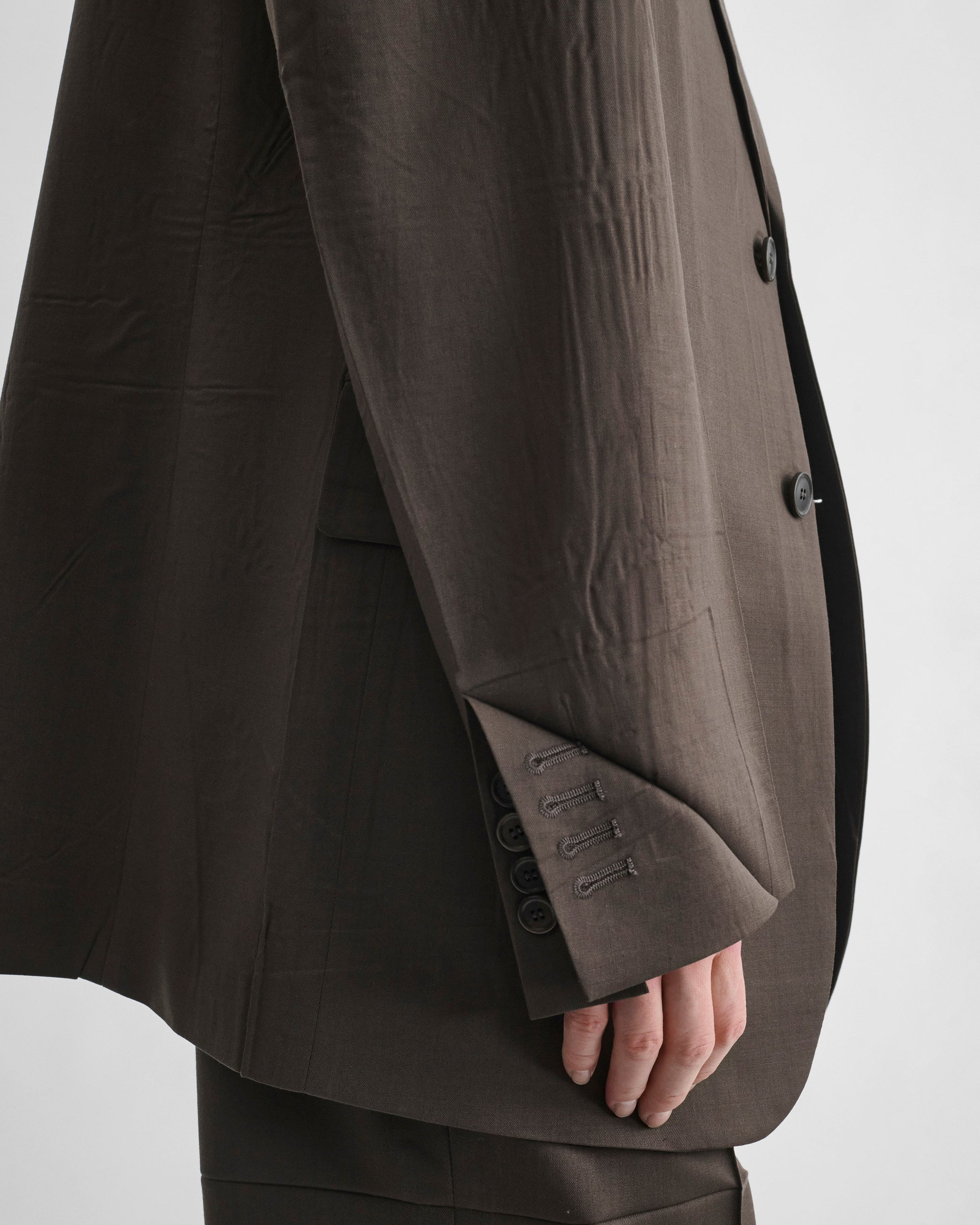 Detail view of model wearing NEAPOLITAN JACKET in brown khaki wool